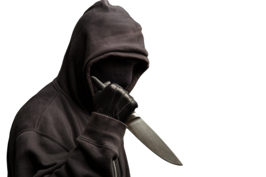 Hooded man holding a knife isolated on white, transparent. Armed attack concept.