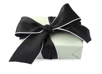 Beautiful gift box with black bow isolated on white