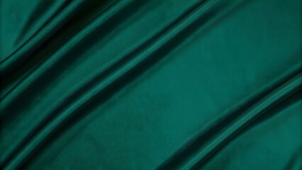 Obraz premium Dark teal green silk satin. Shiny smooth fabric. Soft folds. Luxury background with space for design. web banner. Flat lay, top view table. Birthday, Valentine, New year.