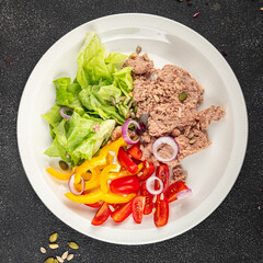 Salad tuna fish fresh vegetables and seafood fresh tasty food dish gourmet food background on the table rustic food top view copy space