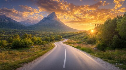 A breathtaking road surrounded by verdant landscapes, leading to the majestic Pedraforca mountain under a vibrant sky in Catalonia, Spain.