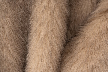 Texture of faux fur as a background, top view.