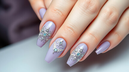a manicure Pastel purple nails have an elegant design with intricate patterns and rhinestones.