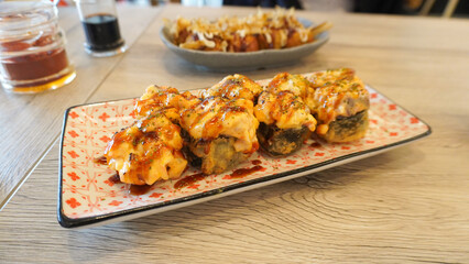 Japanese deep fried mentai sushi food in top of wood table japanese food 