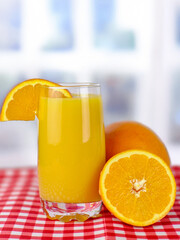 glass of orange juice on a white background