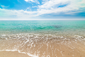 Blue sky and turquoise sea in Solanas beach