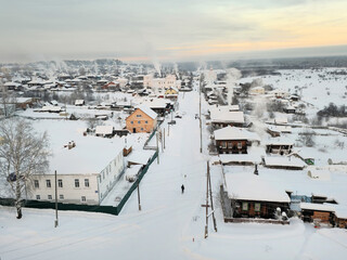 Top view of the snowy winter town Cherdyn. Russia