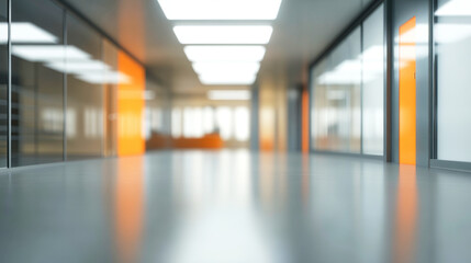 Obraz premium Modern office interior with expansive windows and soft orange accents in a stylish workspace