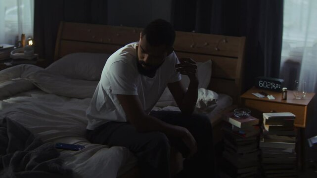 Young black man ignores calls during depression episode