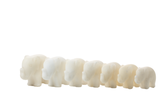 Seven old vintage marble elephants of different sizes on a transparent background. Vintage interior items. PNG. - Powered by Adobe