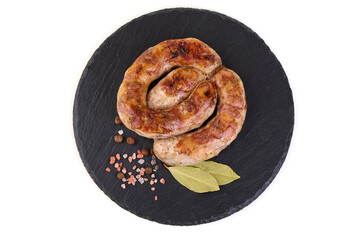 Grilled Sausages, close-up, isolated on white background.