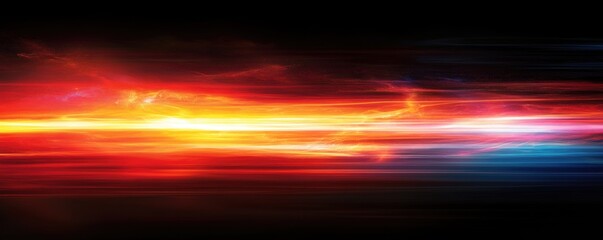 Obraz premium Colorful abstract light streaks on dark background representing speed and energy