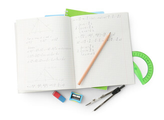 Doing homework. Notebook with math assignment and stationery on white background, top view