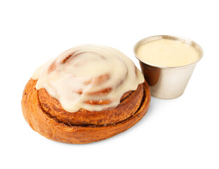 Tasty cinnamon roll with cream isolated on white