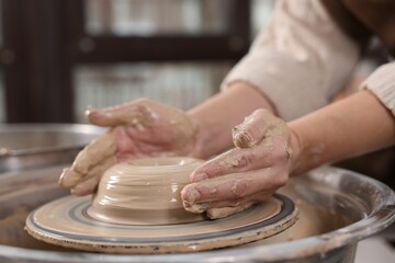 Hobby and craft. Woman making pottery indoors, closeup