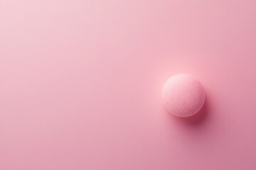 Oral Contraceptive Pills on Soft Pink Canvas â€“ Close-Up View with Copious Copy Space for Pregnancy and Birth Control Themes