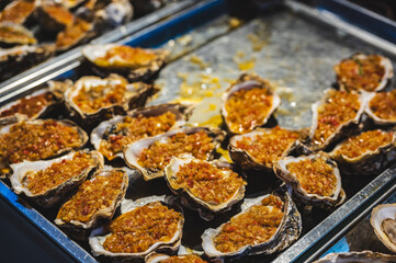 Close up grill oyster in china night market