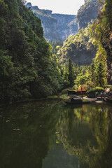 ourists walking along a scenic nature trail