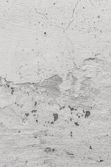 Macro photo of cracked white painted wall.
