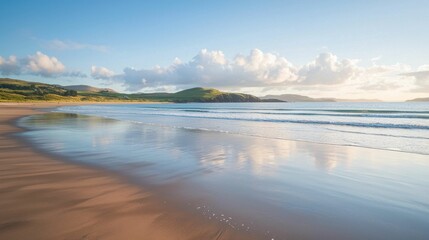 Obraz premium Serene Coastal Landscape with Gentle Waves and Soft Sky Reflections