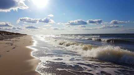 Serene Beach Scene with Gentle Waves Under Bright Sunlight