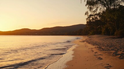 Tranquil Sunset at the Serene Beach with Gentle Waves and Sand