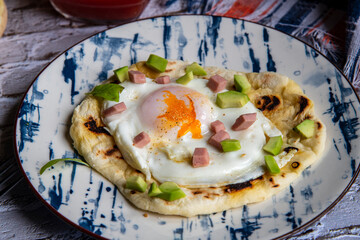 Tortilla with egg and avocado, bullseye egg breakfest, bullseye egg food
