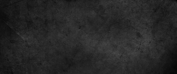 Dark grey textured concrete wall black grunge background