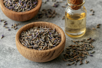 A beautifully arranged laboratory scene featuring dried lavender petals and a glass bottle of lavender essential oil.