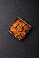 Crispy homemade brown bread chips with seeds and grains