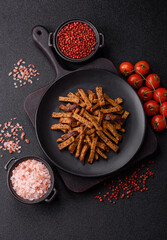 Crispy homemade brown bread crackers or croutons with seeds and grains