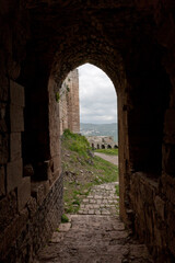 Obraz premium Syria Krak des Chevaliers castle on a cloudy summer day