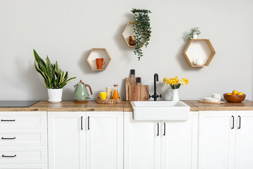 Interior of kitchen with white counter