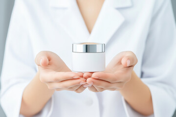 Skincare specialist presenting cream in hands at a clinical setting