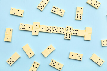 White dominos blocks on blue background