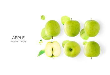 Creative layout made of green applres and watercolor spots on the background. Flat lay. Food concept. Lemon on white background.