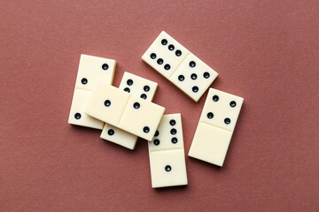 White dominos blocks on brown background
