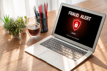 Fototapeta premium Cyber security software show alert of cyber attack for protection snugly. Danger from virus, phishing and cyber fraud.