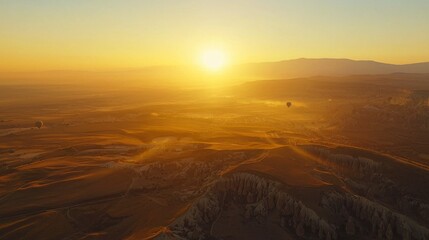 Naklejka premium Golden Sunrise Over Cappadocia's Fairy Chimneys