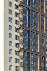 Modern apartment building facade, minimalistic style, light colors, with copy space