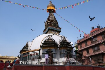 Fototapeta premium Scenery of Kathmandu street with buddhist temple, Nepal