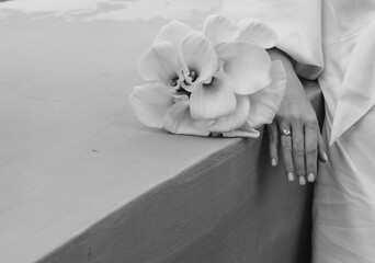 rings on the bride and flowers