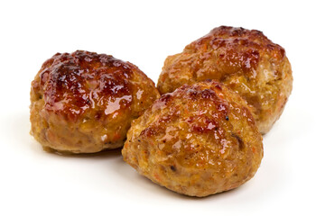 Baked pork meatballs, isolated on white background.