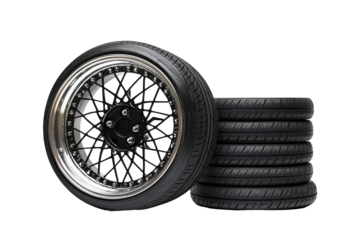 Isolated Stack of Car Tires with a Black and Silver Rim Wheel