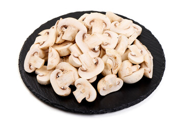 Sliced champignons, close-up, isolated on white background