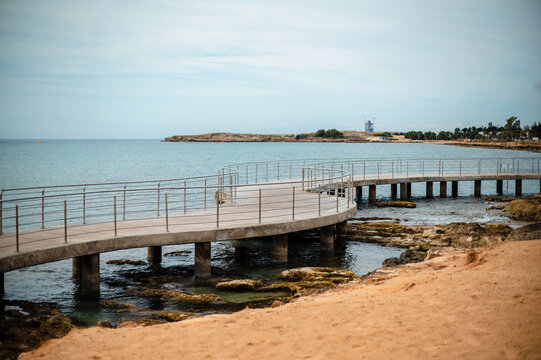 Serene Coastal Pier Over Calm Waters