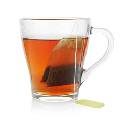 Cup with teabag isolated on white. Brewing aromatic tea