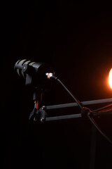 Engaging podcast recording setup with microphone and soft lighting in a studio atmosphere