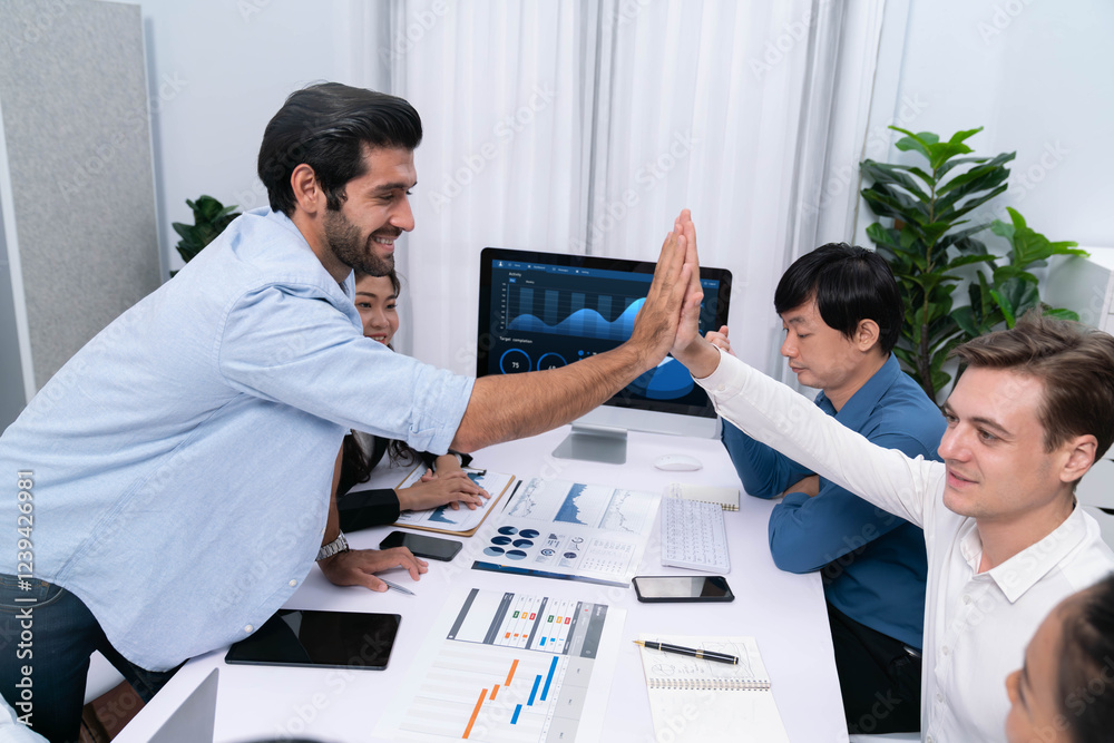 Fototapete analyst team leader celebrate and high five together with his colleague after successful data analys