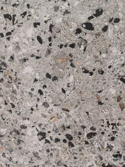 Rough Exposed Aggregate Concrete Surface with Stone Inclusions for Industrial and Architectural Background. Foto